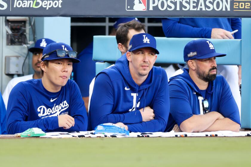 LOS ANGELES, CALIFORNIA - OCTOBER 14: Yoshinobu Yamamoto #18 of the Los Angeles Dodgers.