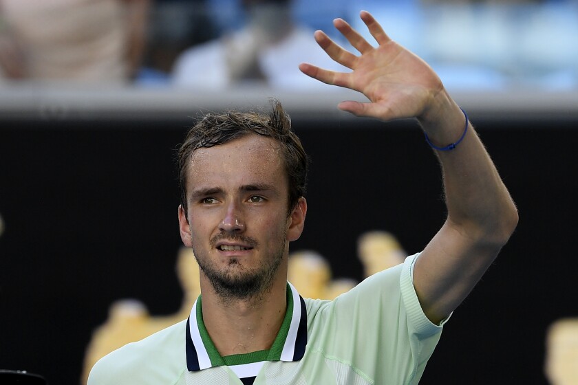 Daniil Medvedev of Russia celebrates after defeating Botic van de Zandschulp of the Netherlands in their third round match at the Australian Open tennis championships in Melbourne, Australia, Saturday, Jan. 22, 2022. (AP Photo/Andy Brownbill)