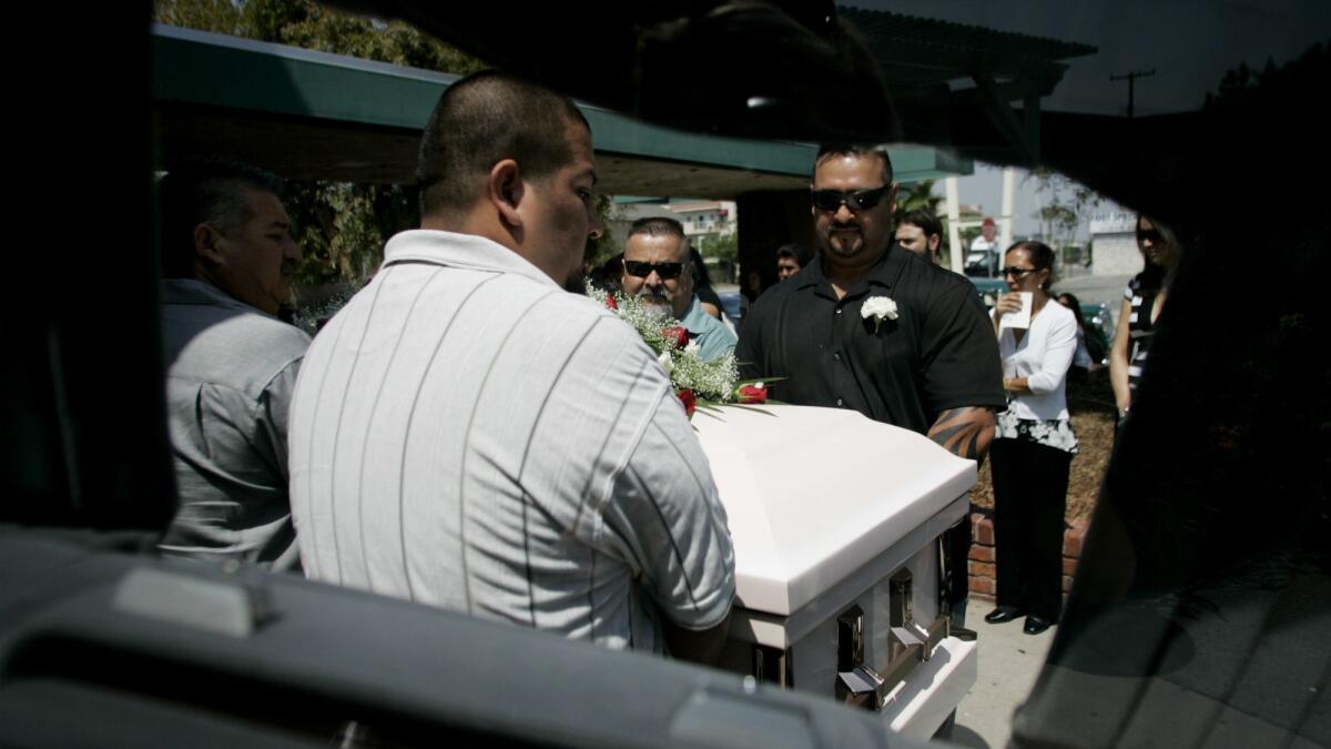 Relatives of Edith Isabel Rodriguez carry her casket after her funeral in Pico Rivera on June 12, 2007. Rodriguez died at Martin Luther King Jr.-Harbor Hospital on May 9 after writhing in pain on the floor of the hospital's emergency room lobby for 45 minutes.