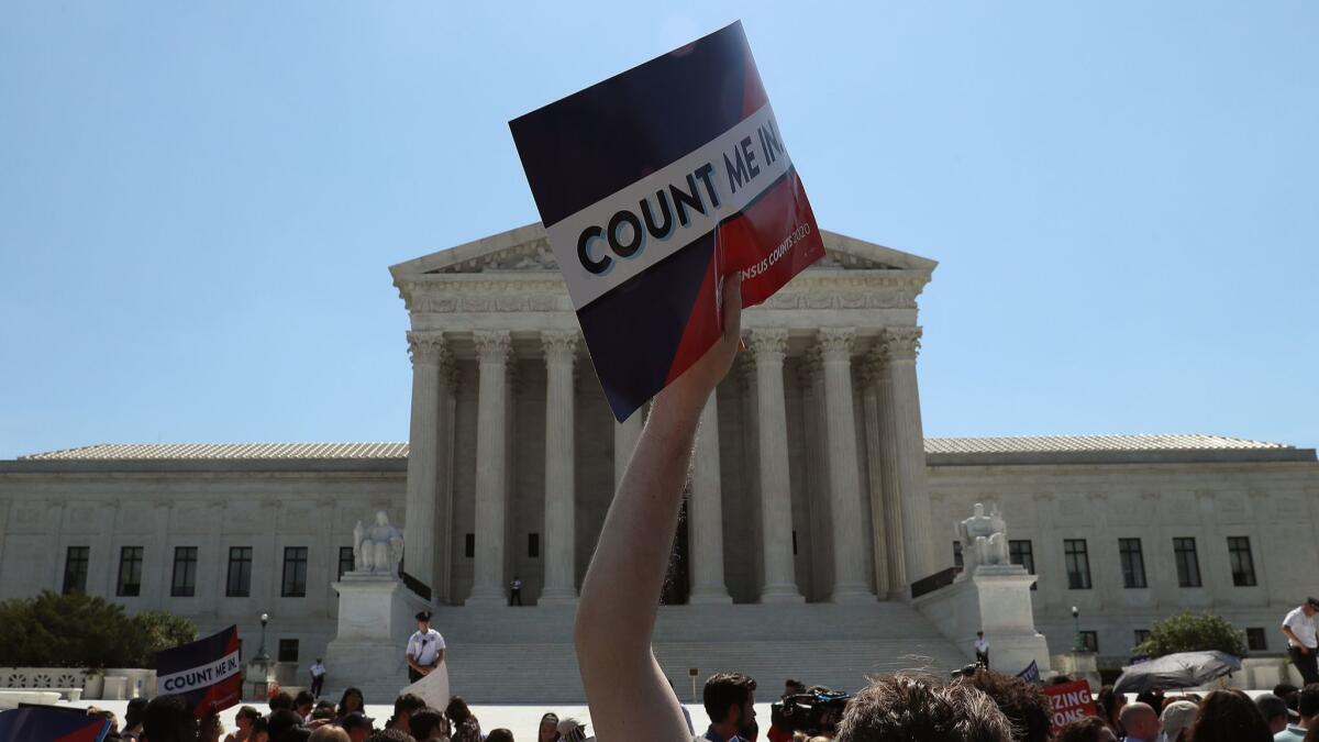 People gather in front of the U.S. Supreme Court after several decisions were handed down on June 27.