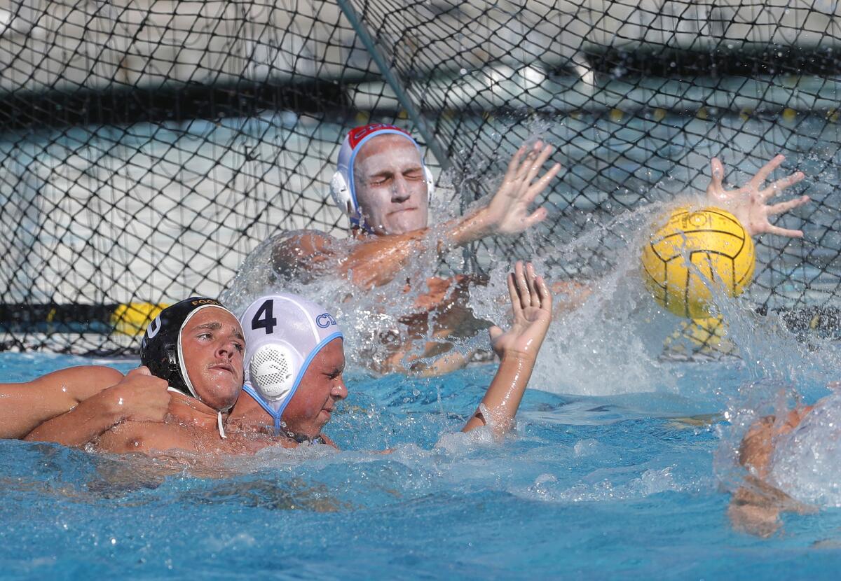 CdM goalie Chase Campbell stretches out for a save in Tuesday's win. 
