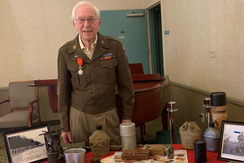 World War II veteran Ken Mallory gives a WWII presentation his Bradbury retirement home.