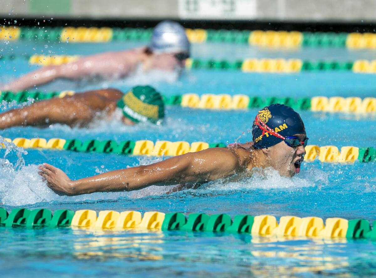 Marina's Winston Lee competes in the boys' 100-yard butterfly during the Wave League swimming finals Thursday.