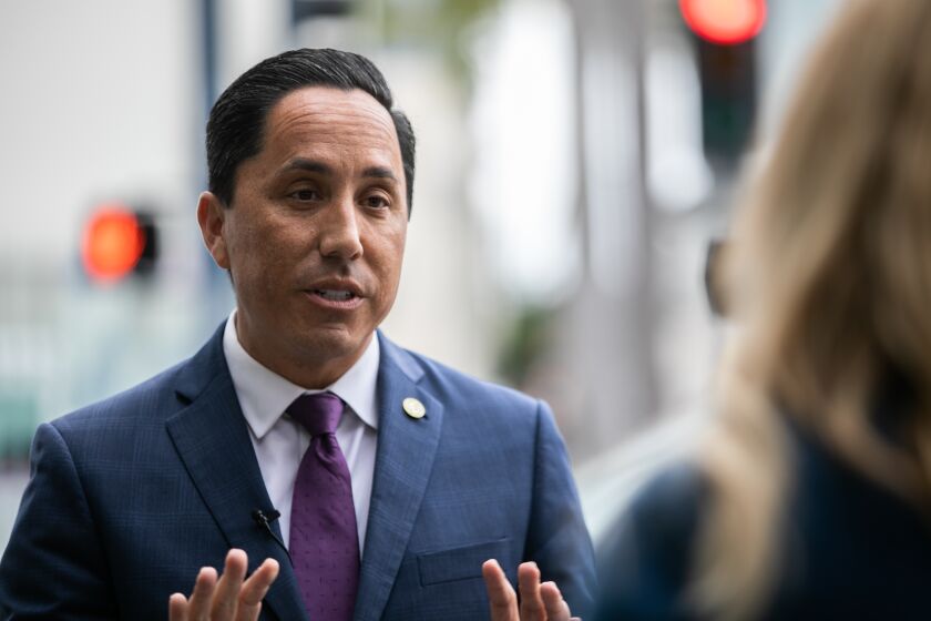 San Diego, CA - May 25: Mayor Todd Gloria speaks to reporters about the city's Hot Spot clean-up team near the U.S. Postal Office in downtown San Diego, CA on Thursday, May 25, 2023. The team travels around different downtown locations looking for places that need to be cleaned up. (Adriana Heldiz / The San Diego Union-Tribune)