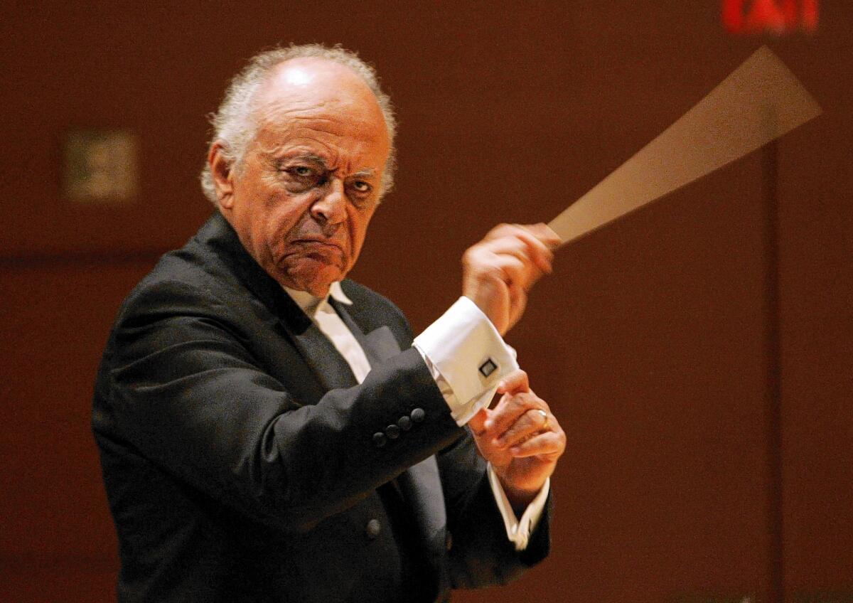 Lorin Maazel conducts the Israel Philharmonic at Walt Disney Concert Hall. He has died of complications from pneumonia at his home in Castelton, Va., at 84.