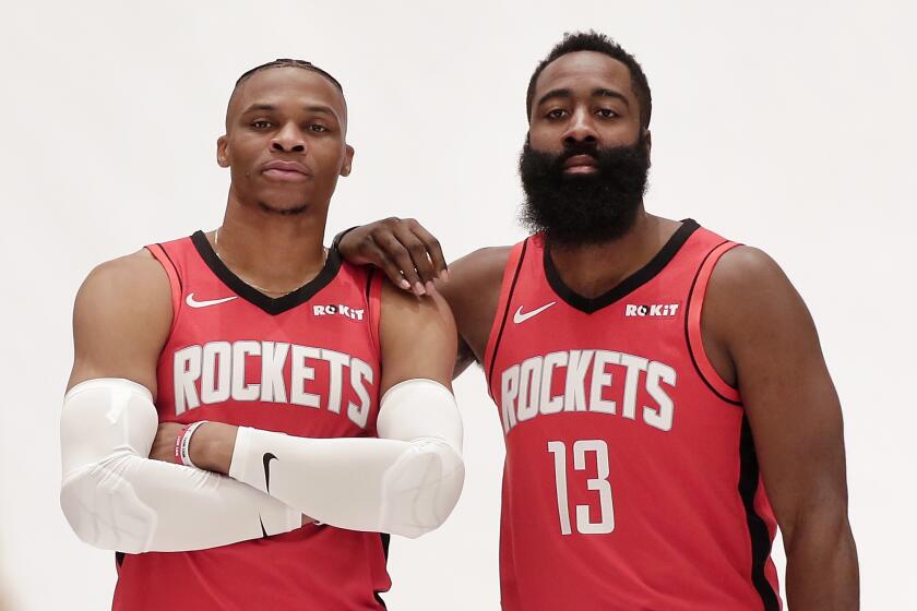 FILE - In this Sept. 27, 2019, file photo, Houston Rockets' Russell Westbrook and James Harden, right, are photographed together during NBA basketball media day in Houston. Teams who longed to build a Big Three are now striving for a dynamic duo, hoping two premier players are good enough to win a championship when the belief used to be that it required a trio. (AP Photo/Michael Wyke, File)