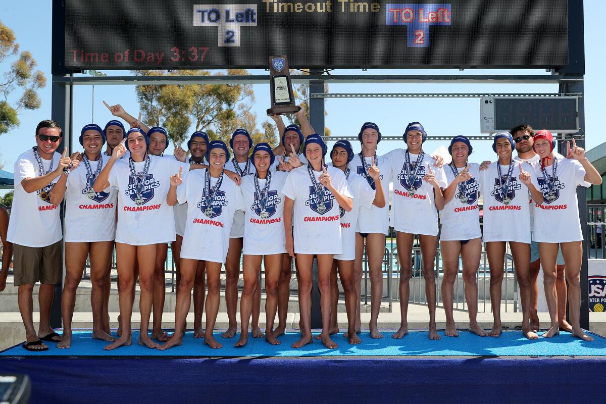Vanguard Aquatics poses with the championship trophy after beating San Diego Shores in the Junior Olympics 16U title match.
