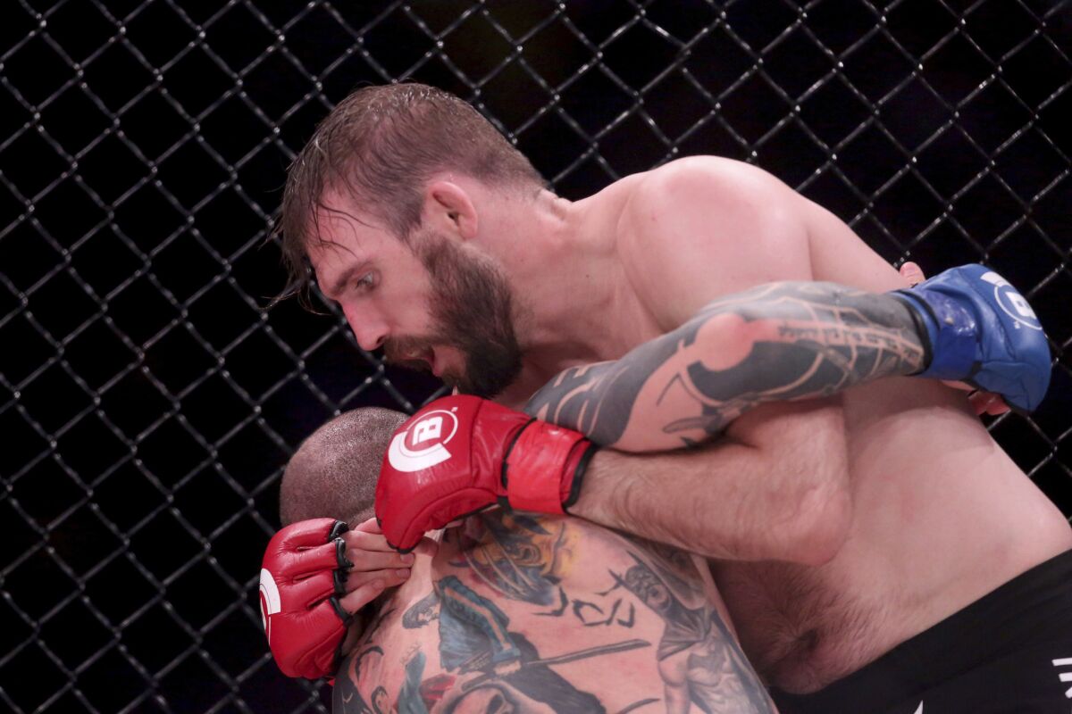 Ryan Couture grapples with Haim Gozali during their bout at Bellator NYC.