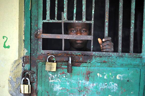 A patient of the Haitian government's Mars and Kline psychiatric hospital is detained in its locked courtyard in downtown Port-au-Prince in February. The hospital was founded in 1958, which might be when its wards received their last coat of paint, and was in a desperate situation even before the Jan. 12 earthquake. Louis Marc Jeanny Girard, a psychiatrist who has served as the hospital's medical director for 10 years, said Haiti has never treated mental illness with much care. Often, he said, people suffering psychoses were dismissed as being in the grip of the "mystical."