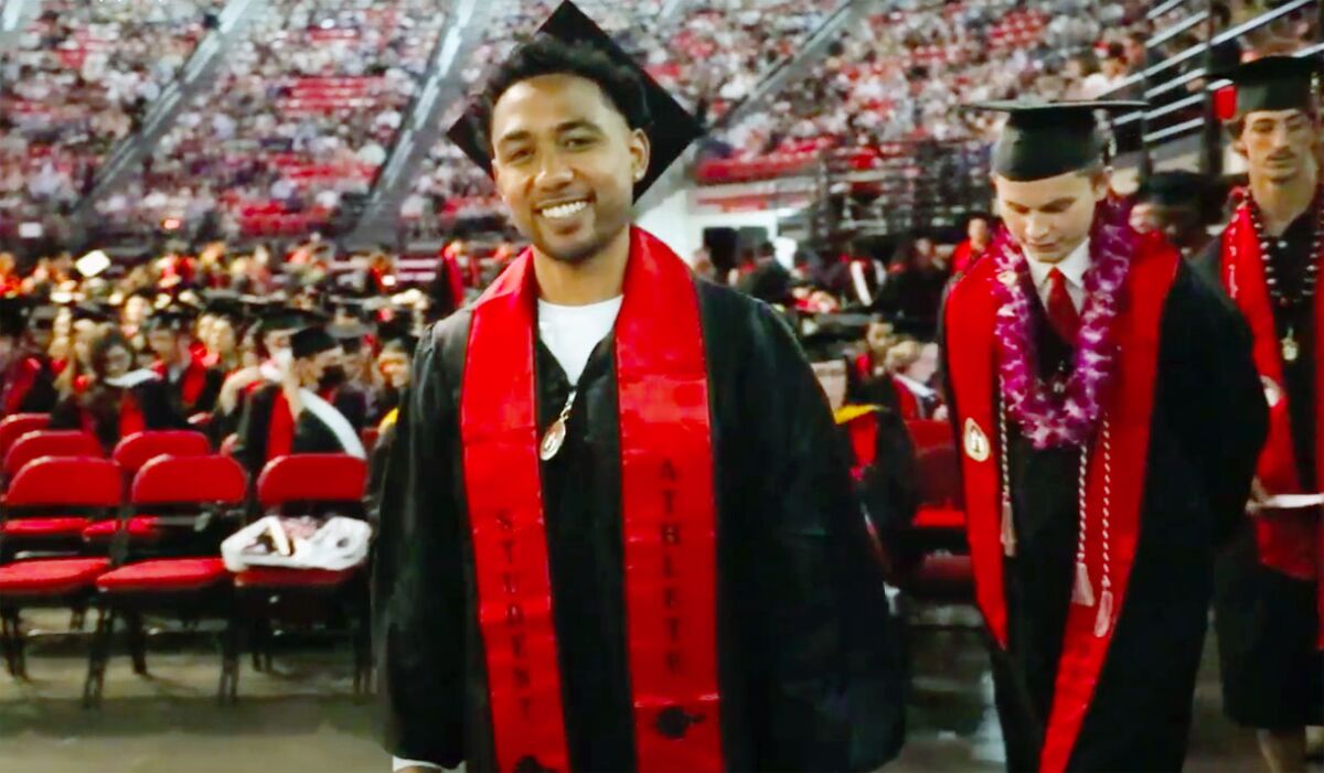 Former San Diego State running back DJ Pumphrey approaches the stage at Viejas Arena to receive his diploma.