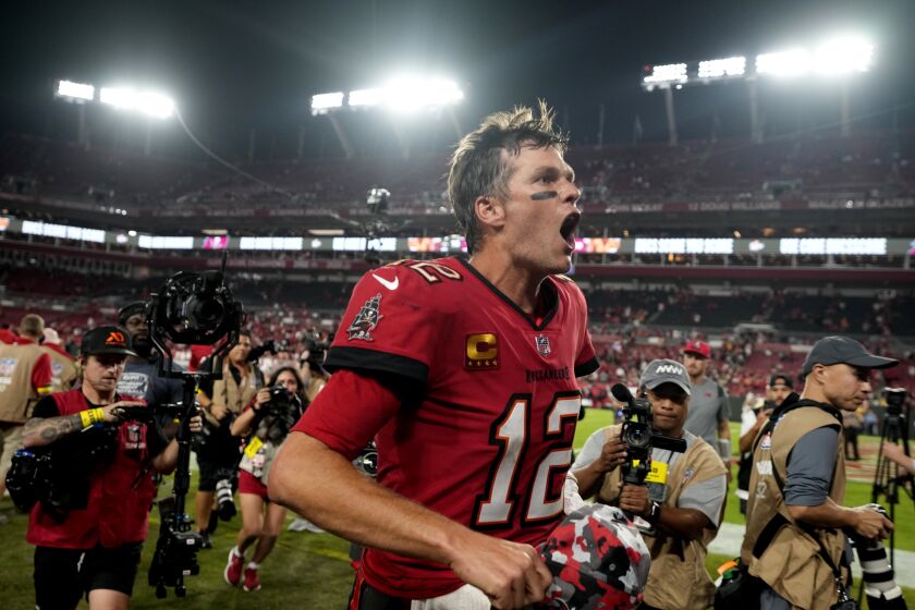 Tampa Bay Buccaneers quarterback Tom Brady (12) reacts to the fans as he runs off the field after an NFL football game against the New Orleans Saints in Tampa, Fla., Monday, Dec. 5, 2022. The Buccaneers won 17-16. (AP Photo/Chris O'Meara)