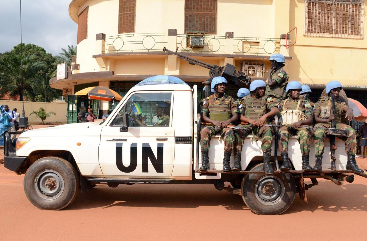 United Nations peacekeeping soldiers from Rwanda patrol in the Central African Republic capital, Bangui, in December.