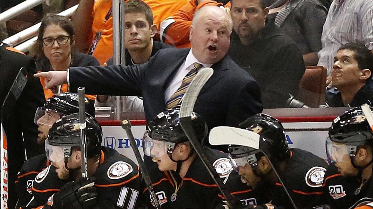 Ducks Coach Bruce Boudreau directs his players during the closing stages of Game 2 of the Western Conference semifinals against the Kings on May 5. Boudreau is on the cusp of reaching a NHL conference final for the first time in his coaching career.