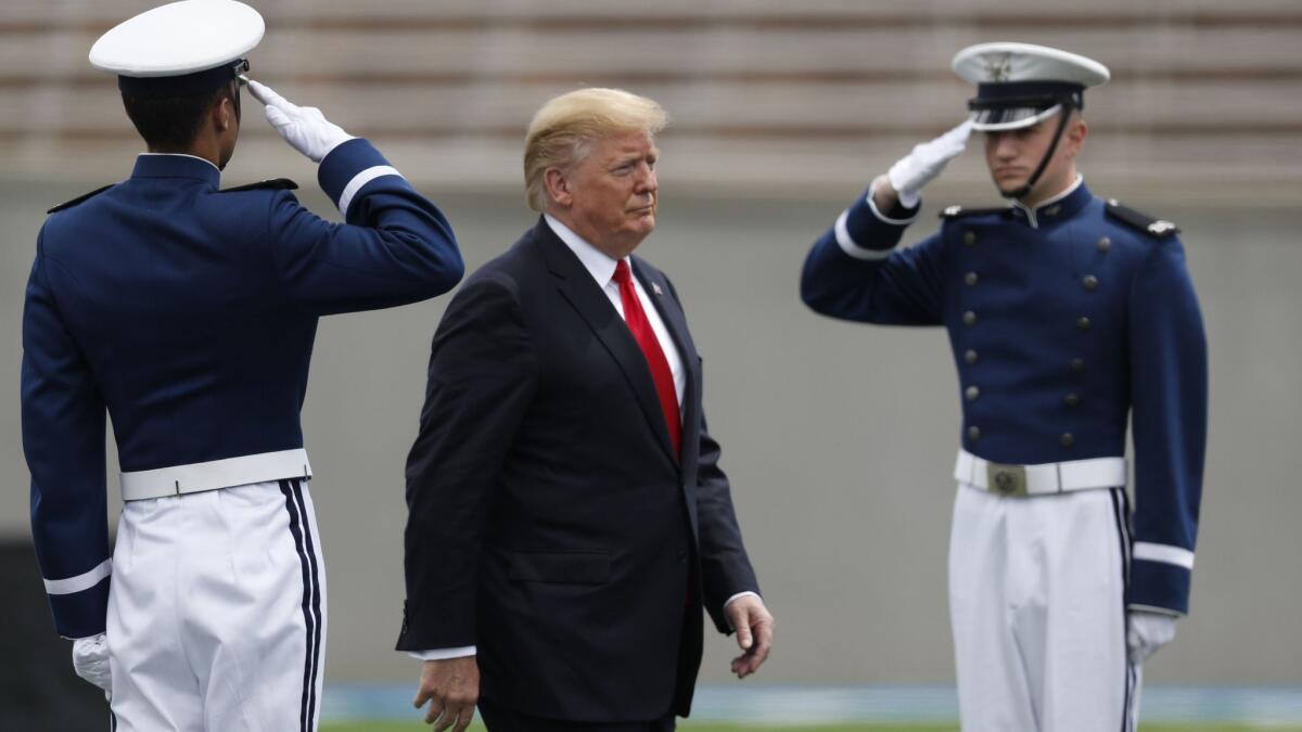 President Donald Trump walks to the podium at the U.S. Air Force Academy graduation on May 30 at Air Force Academy in Colorado.