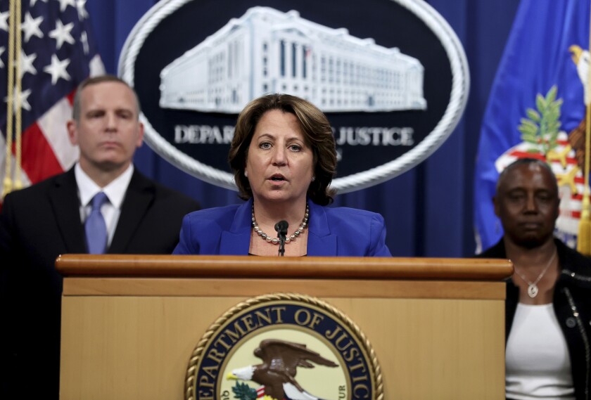 Deputy Attorney General Lisa Monaco announces the recovery of millions of dollars worth of cryptocurrency from the Colonial Pipeline Co. ransomware attacks as she speaks during a news conference with FBI Deputy Director Paul Abbate and acting U.S. Attorney for the Northern District of California Stephanie Hinds at the Justice Department in Washington, Monday, June 7, 2021. (Jonathan Ernst/Pool via AP)