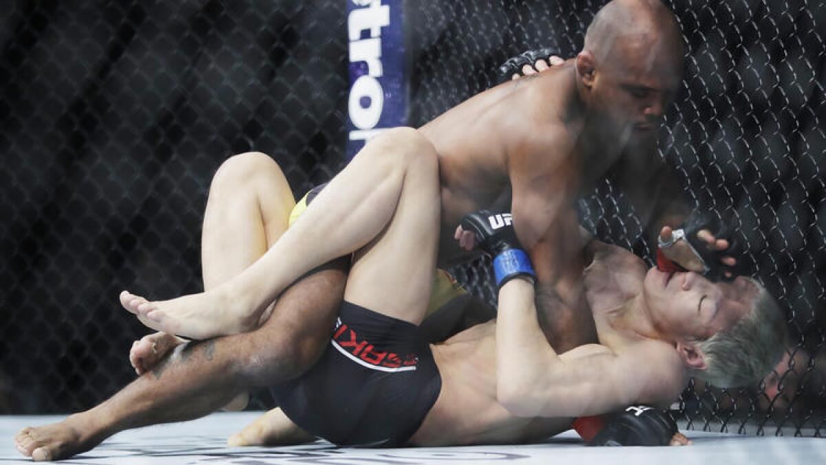 Wilson Reis pummels Ulka Sasaki during their flyweight fight at UFC 208.