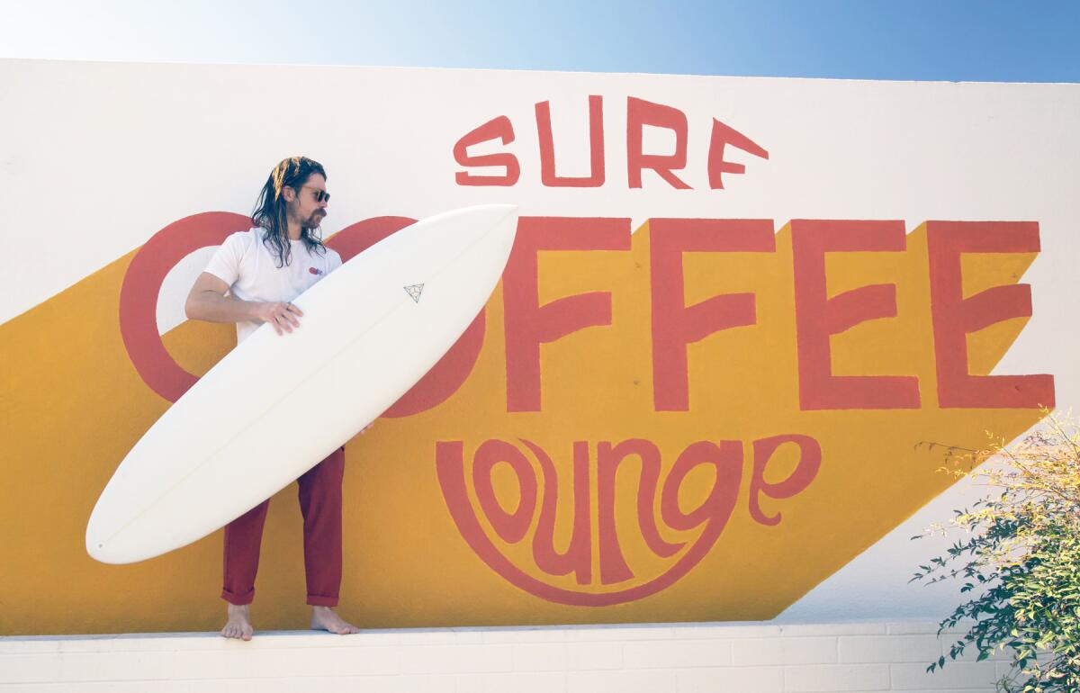 At Surf Lounge in Pacific Beach you can get a cup of coffee and a surf board.