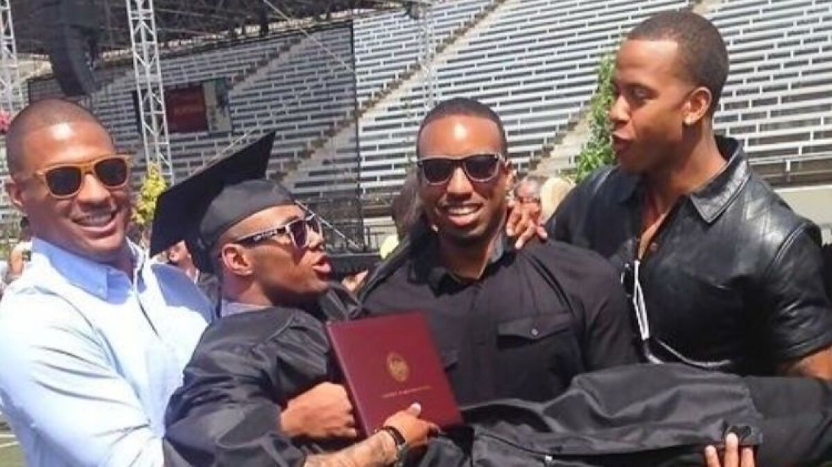 From left to right, Mike McCord, Brandon Dodson, Andrew Swink and Rams cornerback Trumaine Johnson at Dodson's college graduation a few years ago. The former Montana teammates bonded over football and Monopoly.