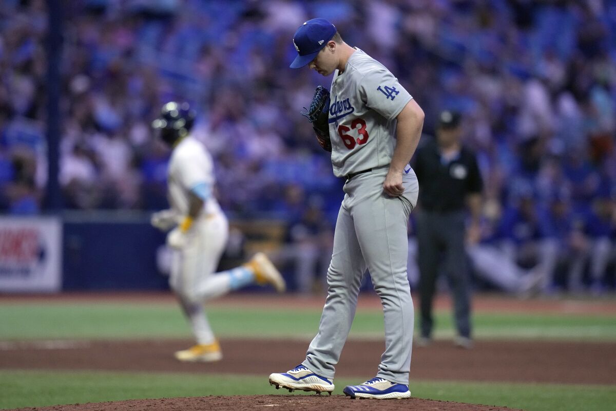 Dodgers reliever Justin Bruihl reacts as the Rays' Jose Siri rounds the bases after hitting a two-run home run May 26, 2023.