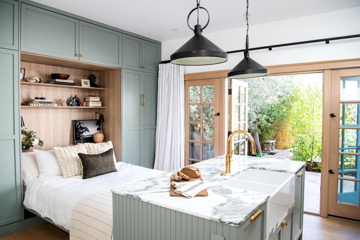 A Murphy bed in the kitchen space of an ADU