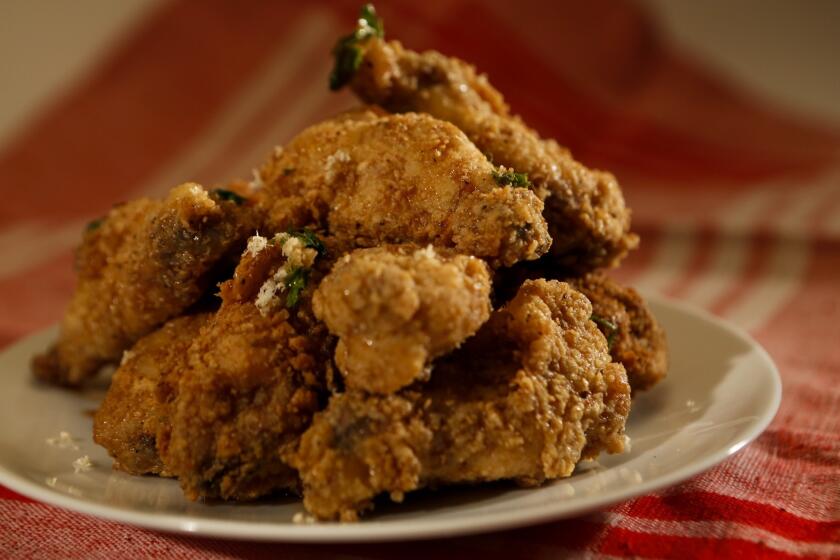 Crispy apple wings are flavored with fresh horseradish and curly parsley. Recipe: Apple wings