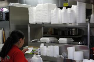 The San Diego City Council will vote on aban on polystyrene food and beverage containers on Monday, Oct. 15, 2018. Here, an employee gathers an order among styrofoam containers at a Mexican food restaurant in Clairemont. (Photo by K.C. Alfred/San Diego Union-Tribune)