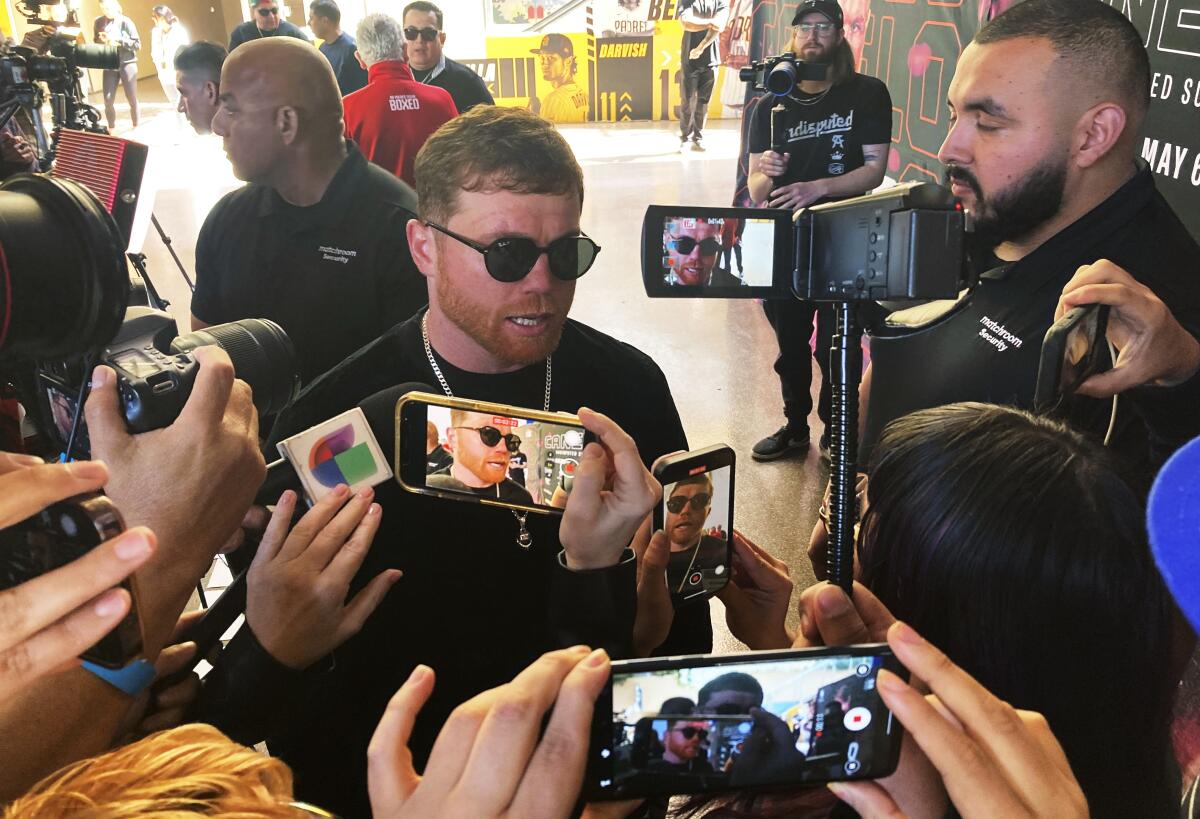 Super middleweight champion Canelo Alvarez speaks to the media before a news conference in San Diego on March 16.