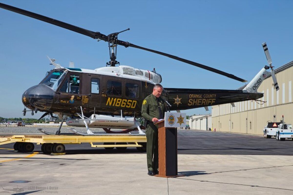 Orange County Sheriff Don Barnes speaks at a news conference in August. 