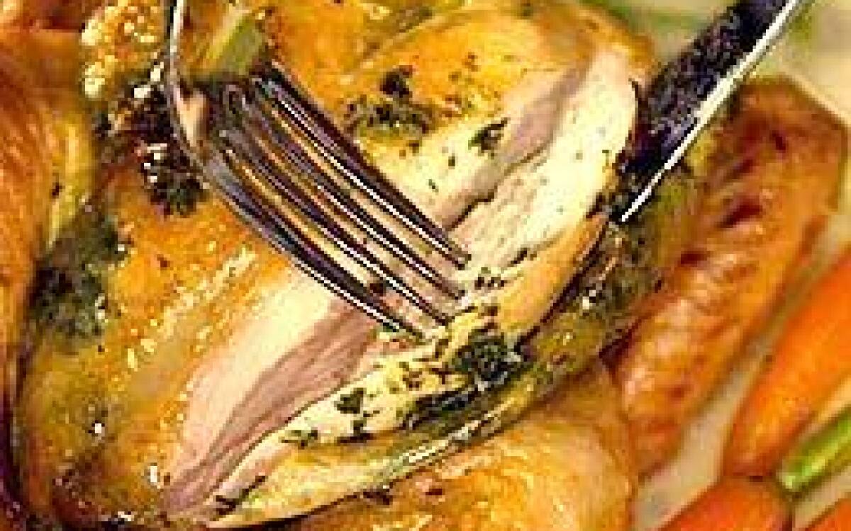 Roast poussin with spring garlic-herb stuffing