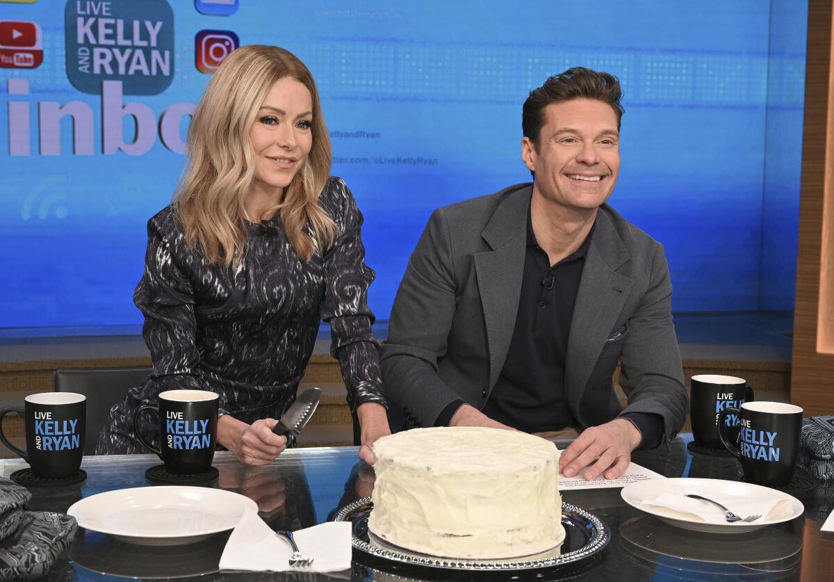Kelly Ripa and Ryan Seacrest on the set of their old morning show.