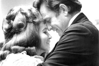 An archival photo of June Carter Cash and Johnny Cash