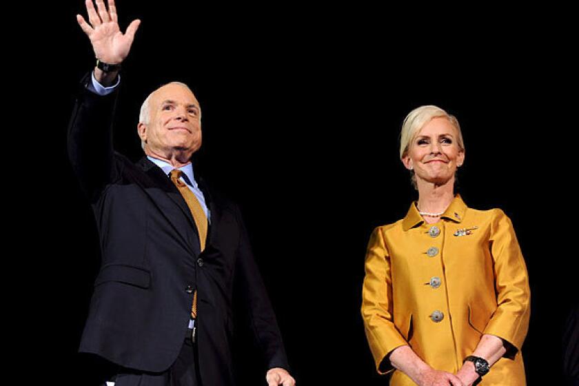 McCain and his wife, Cindy, acknowledge supporters at his concession speech in Phoenix.