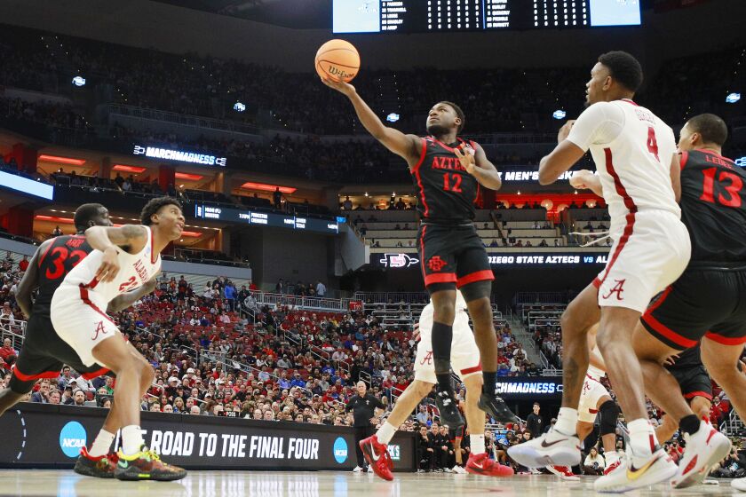 Louisville, KY - March 24: San Diego State's Darrion Trammell scores against Alabama during a Sweet 16 game in the NCAA Tournament on Friday, March 24, 2023 in in Louisville, KY. (K.C. Alfred / The San Diego Union-Tribune)