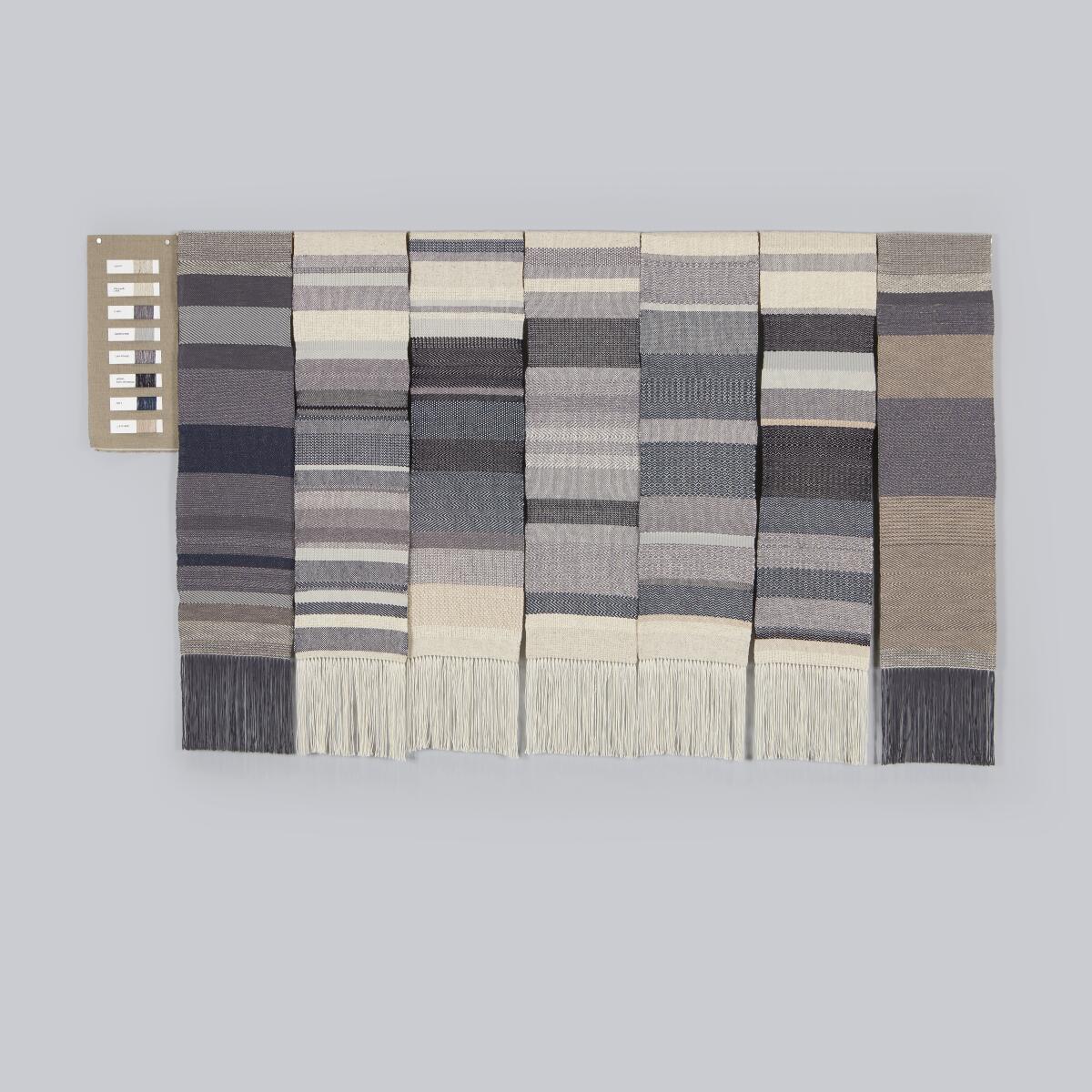 A photo of Ahree Lee's textile artwork "Timesheet."