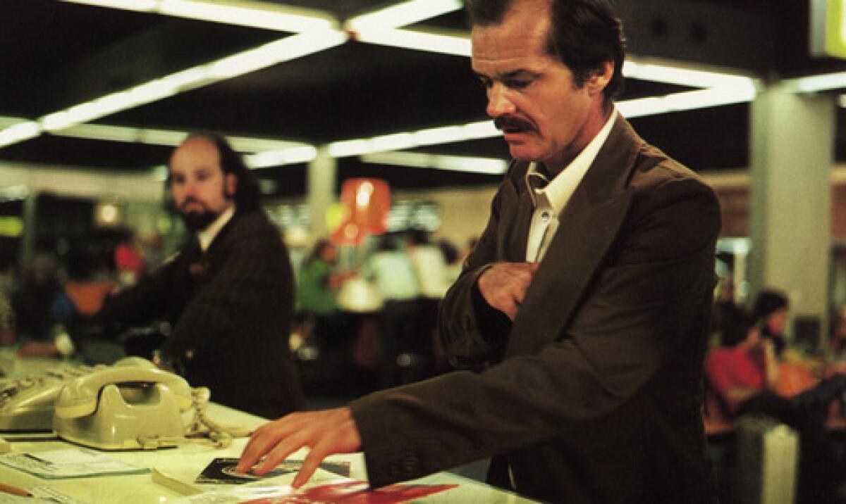 A man sits astatine a table successful an unfastened office.