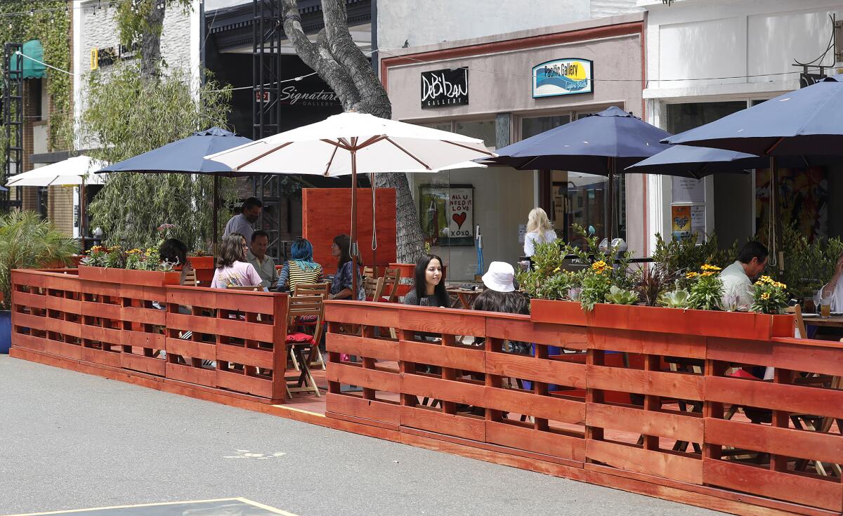 Outdoor dining on newly built decks is one of the new features on the Promenade on Forest in downtown Laguna Beach.