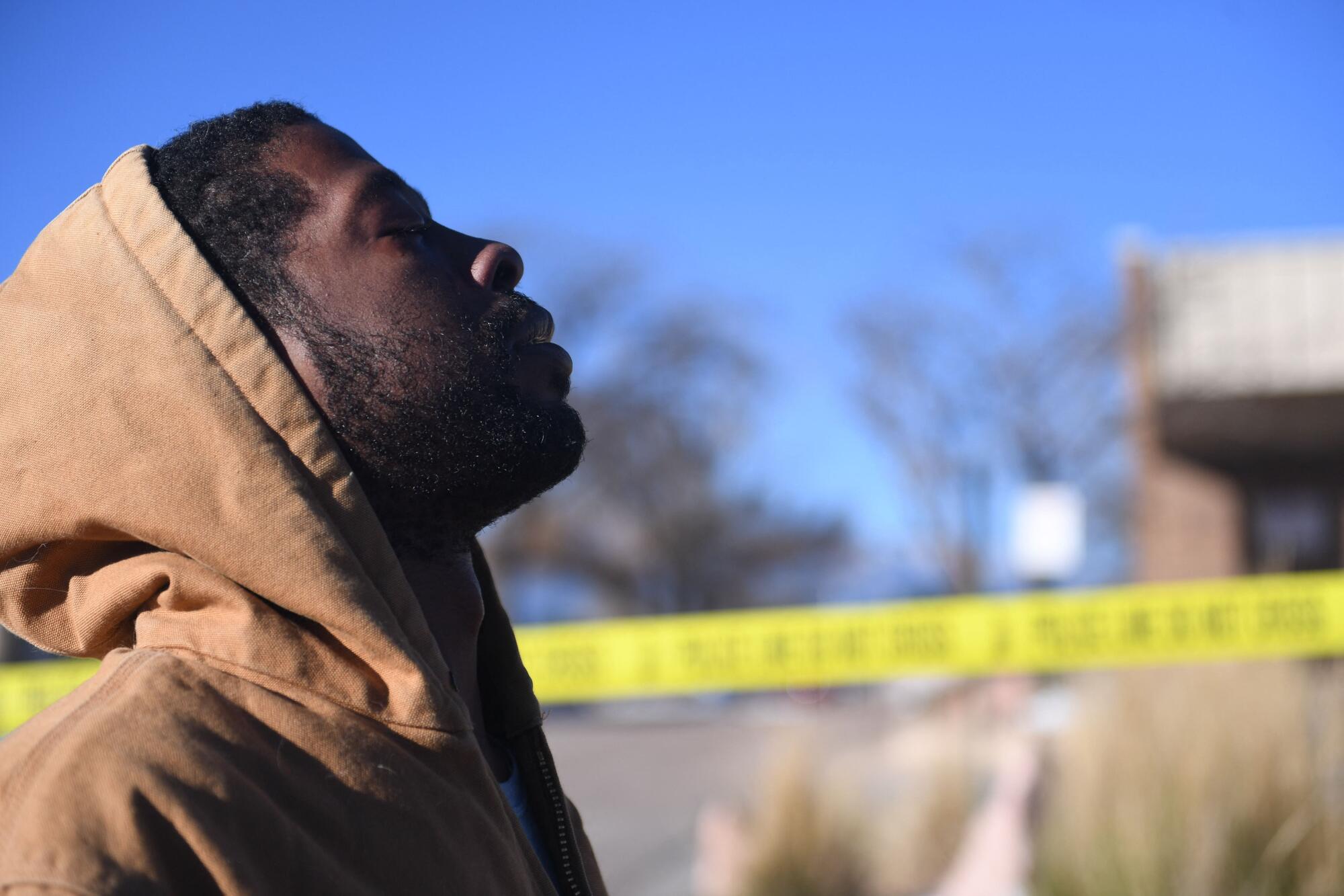 Joshua Thurman reacts the morning after a mass shooting at Club Q.