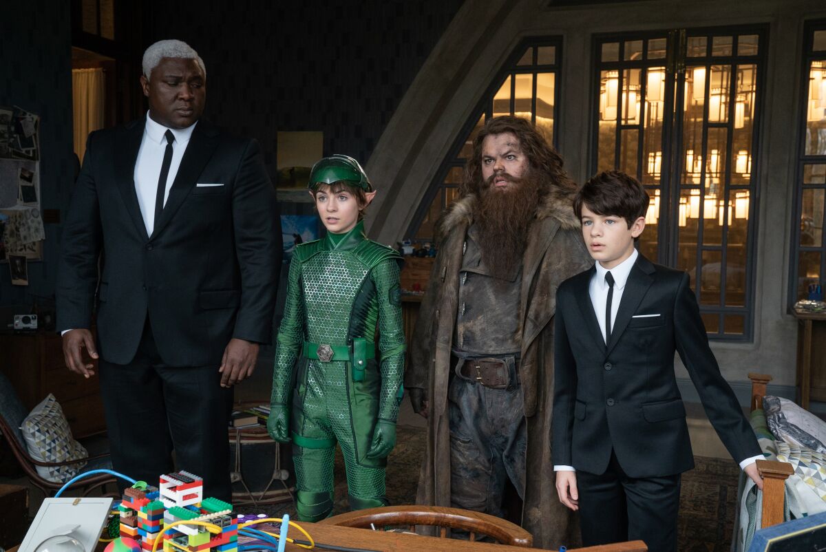 Nonso Anozie is Butler, left, Lara McDonnell is Holly Short, Josh Gad is Mulch Diggums and Ferdia Shaw is Artemis Fowl in Disney's "Artemis Fowl."
