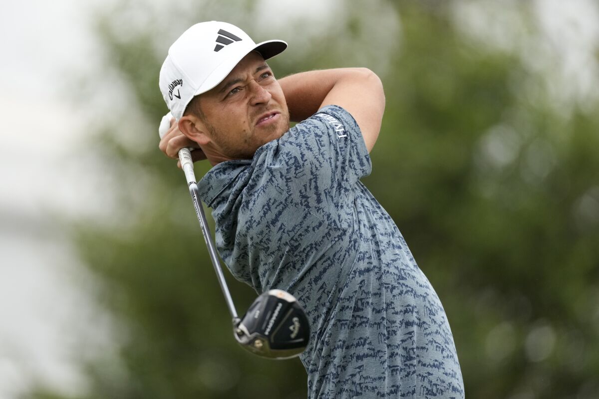 Xander Schauffele watches his tee shot on the 17th hole during the first round of the U.S. Open on Thursday.