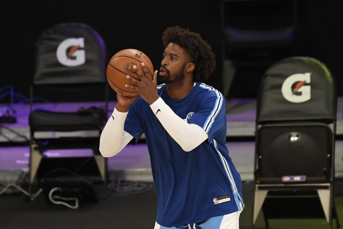Lakers guard Wesley Matthews warms up before a game against the Minnesota Timberwolves.