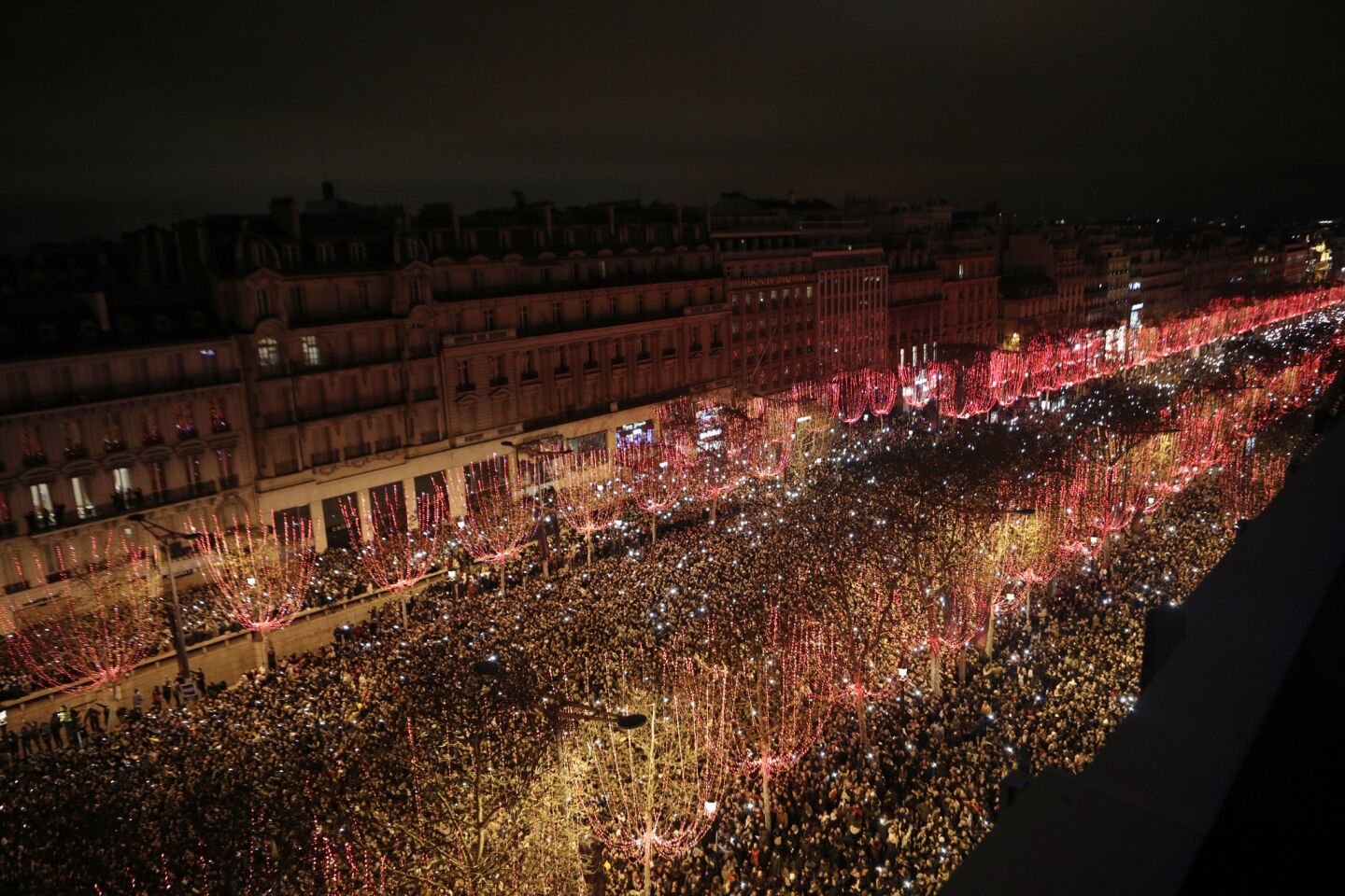 The Champs Elysees in Paris is thronged with New Year's revelers.