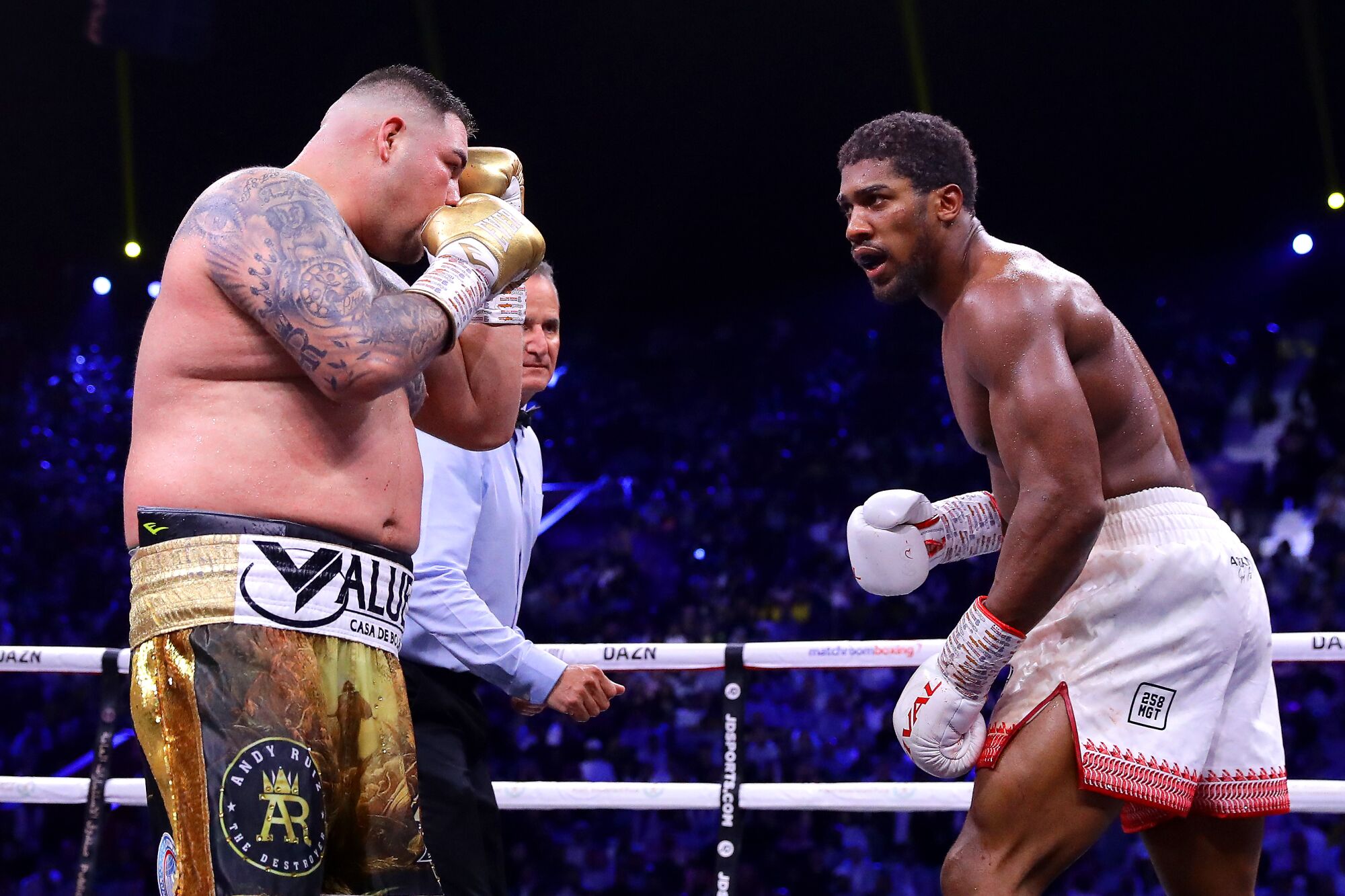 Anthony Joshua, right, taunts Andy Ruiz Jr. during their heavyweight title match Dec. 7, 2019, in Saudi Arabia.
