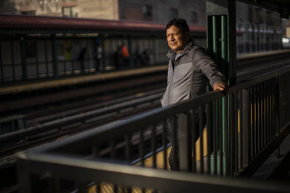 Ecuadorian immigrant Neptali Chiluisa waits the subway as he returns from his temporary job in the borough of Bronx on Monday, Oct. 25, 2021, in New York. Chiluisa, 47, crossed the border in June in Arizona and was detained for a week with his 14-year-old son, leaving behind his wife and three other children in Ecuador. He acknowledges coming for economic reasons and wonders if he has any options for temporary legal status.(AP Photo/Eduardo Munoz Alvarez)