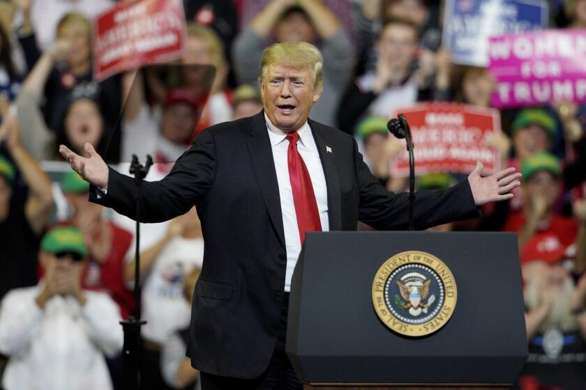 President Donald Trump speaks during a Make America Great Again rally at the Mid-America Center in Council Bluffs, Iowa, Tuesday, Oct. 9, 2018. (AP Photo/Nati Harnik)