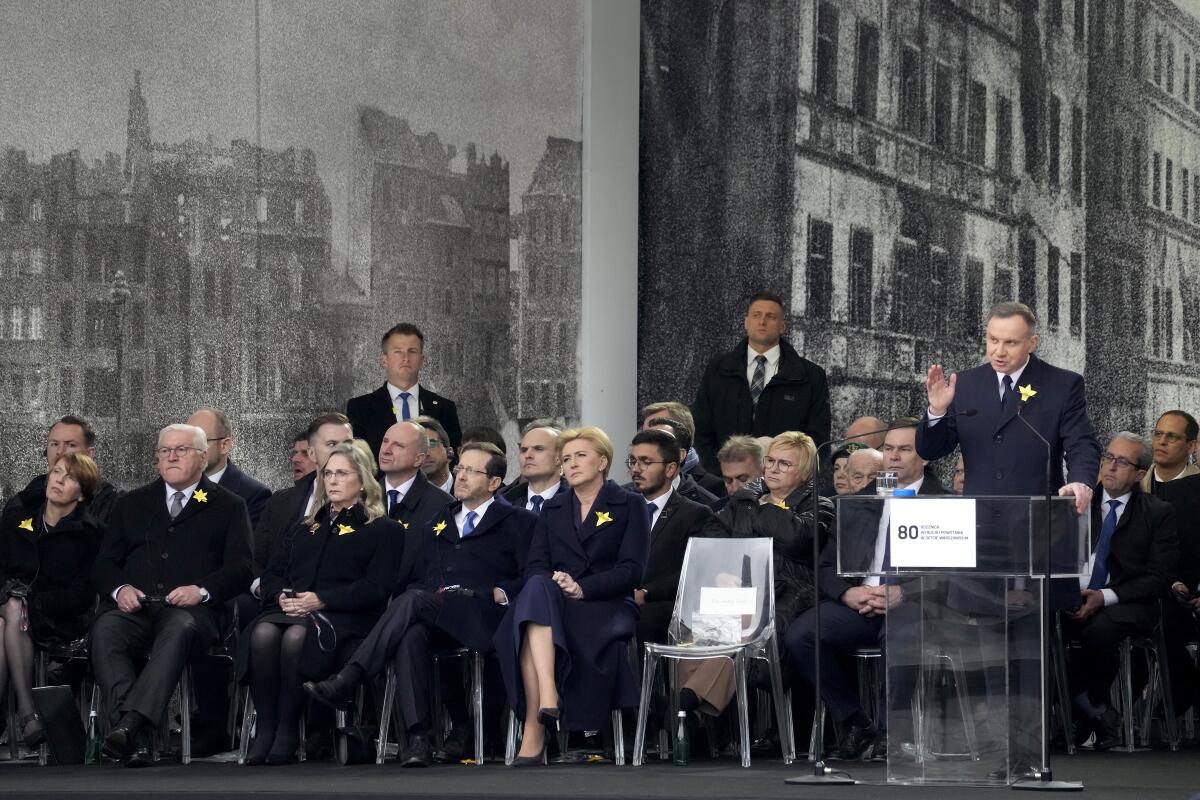 Polish President Andrzej Duda speaks at a solemn gathering.