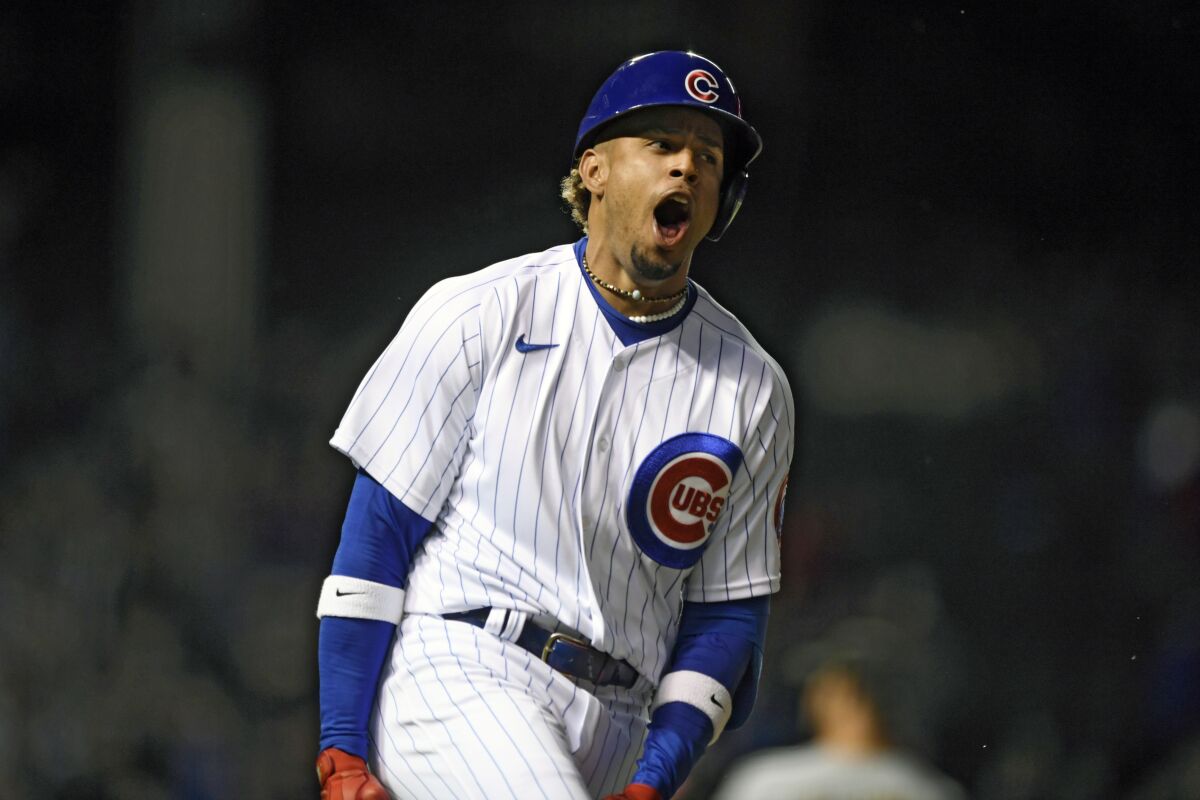 Chicago Cubs' Christopher Morel reacts after hitting a solo home run in his first major league at bat during the eighth inning of a baseball game against the Pittsburgh Pirates Tuesday, May 17, 2022, in Chicago. Chicago won 7-0. (AP Photo/Paul Beaty)
