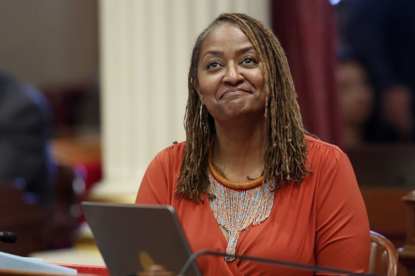 FILE - In this July 8, 2019 file photo, state Sen. Holly Mitchell, D-Los Angeles, reacts in the Senate chamber in Sacramento, Calif. Los Angeles County voters were favoring Assemblywoman Sydney Kamlager in a special election to replace former state Sen. Mitchell, who left in mid-term for the county board of supervisors. Early election returns Tuesday, March 2, 2021, showed Kamlager, with an edge in the seven-candidate field in the 30th Senate District. (AP Photo/Rich Pedroncelli, File)