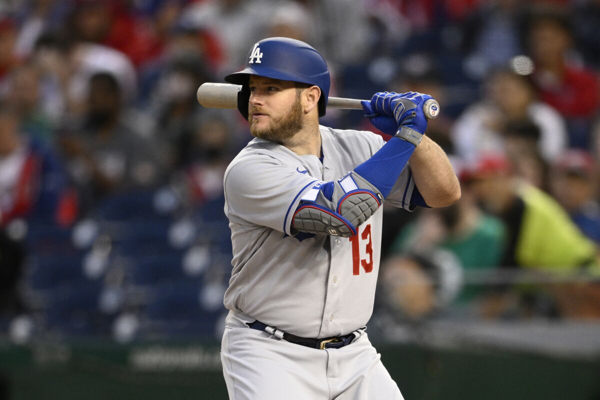 Los Angeles Dodgers' Max Muncy (13) in action during a baseball game.