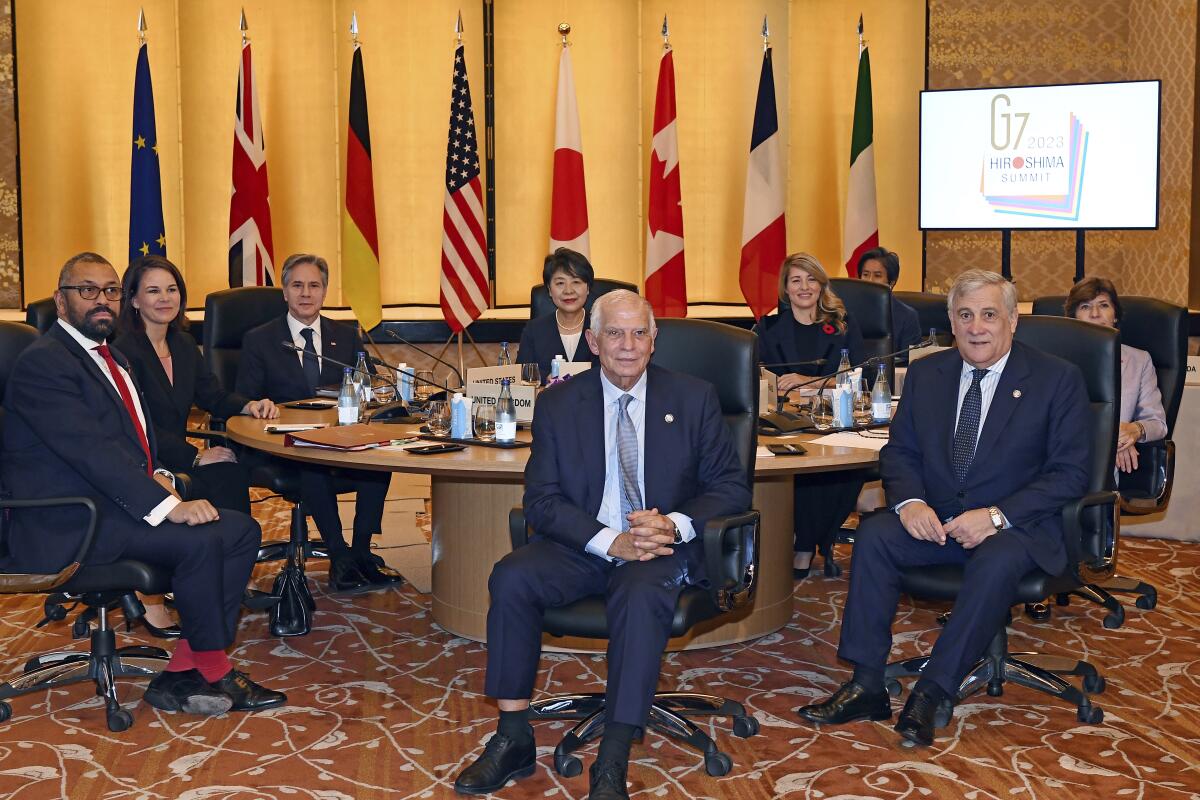 Top diplomats from Group of 7 nations around a table
