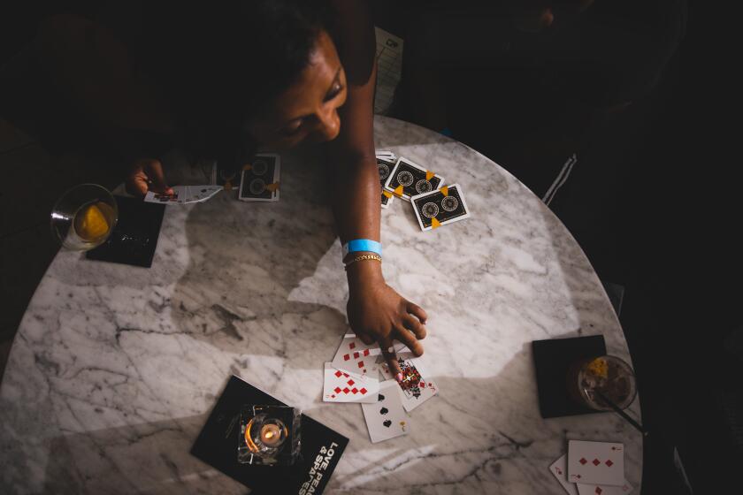 Los Angeles, CA - June 07: Heated debate is common place in a good spades game on Wednesday, June 7, 2023 in Los Angeles, CA. (Jason Armond / Los Angeles Times)